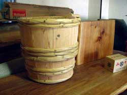 ���߂���